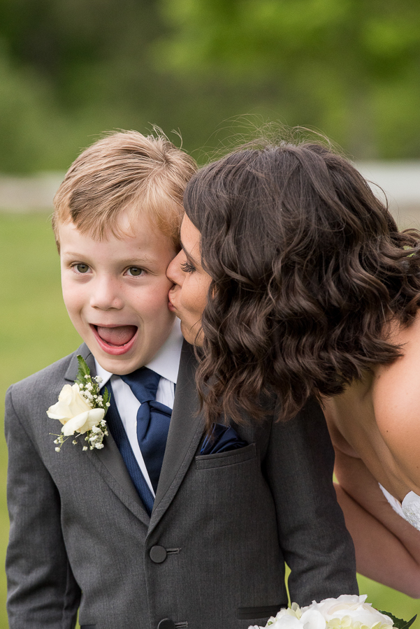 Greenwich CT Wedding Photographer captures cute moment between Bride and Ring Bearer